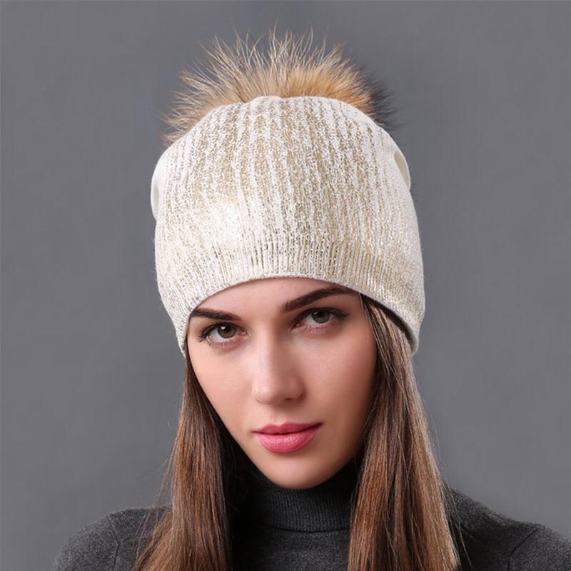 Beanie with fur pompom, cream color with shiny gold